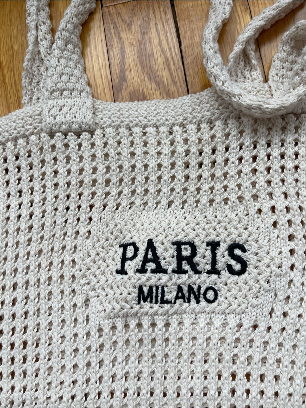 Handwoven Natural Straw Tote Bag with Logo Accent - Picture 3 of 3